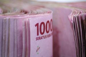 Rupiah Meroket Dolar Loyo
