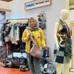 Jeans Bekas Antar Erna ke Panggung Nasional