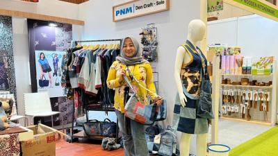 Jeans Bekas Antar Erna ke Panggung Nasional