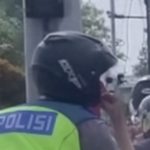 Polisi Merokok di Motor Viral Sanksi Menanti